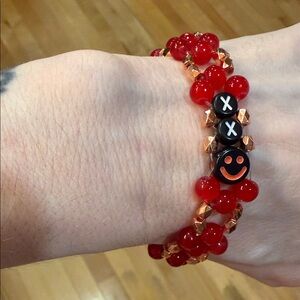 Handmade Red and Black glass Beaded Bracelet with XX and Smiley 😃